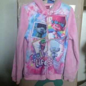 A pink trolls sweater